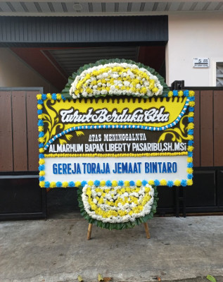 Papan Bunga Duka di Sakti